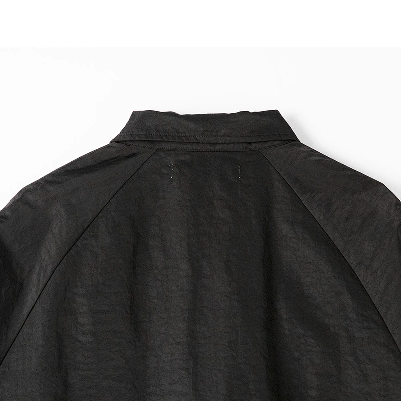 minimalist button-up jacket
